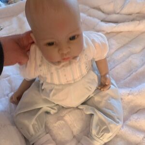 Adorable Baby Doll with White and Blue Outfit